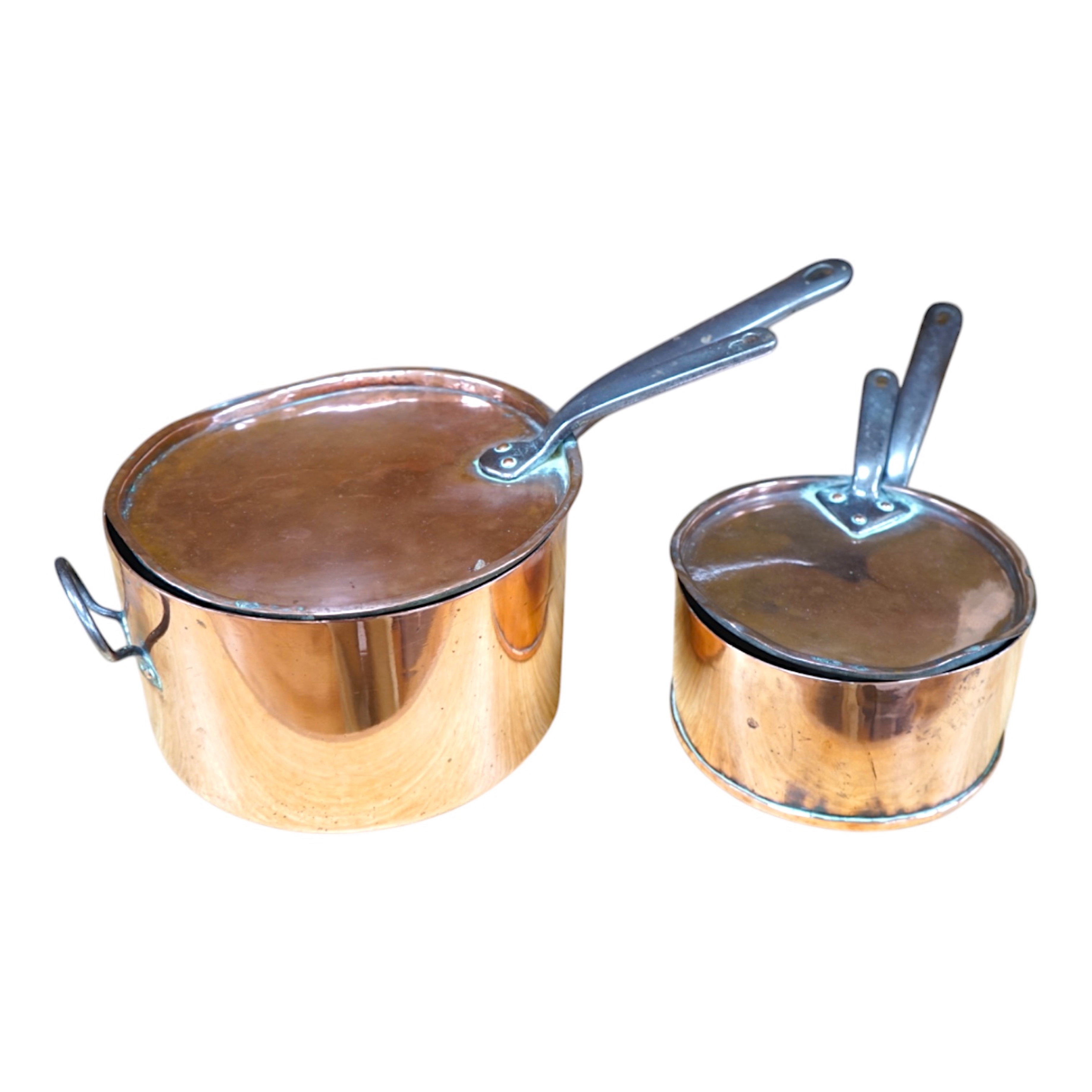 Two 19th century graduated copper and wrought iron saucepans and covers. Condition - fair to good